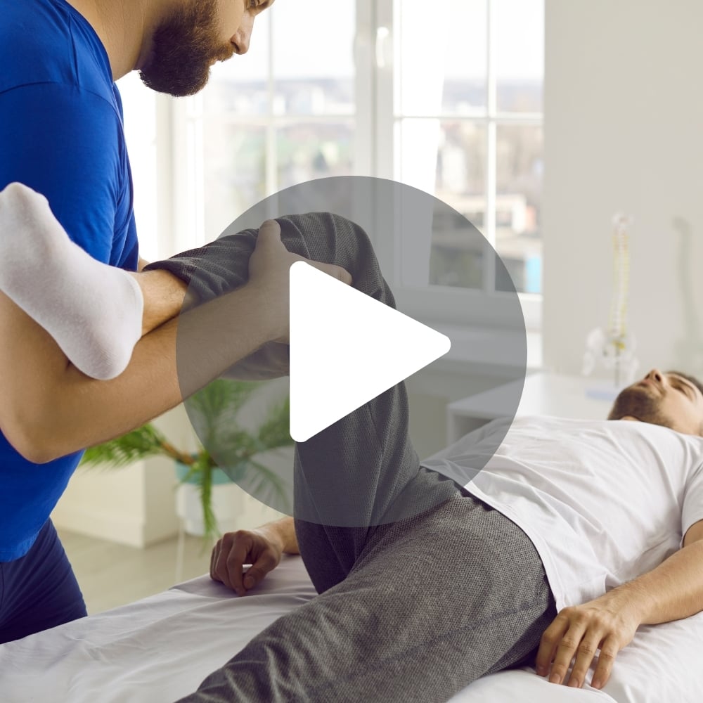 Male chiropractor performing alignment 