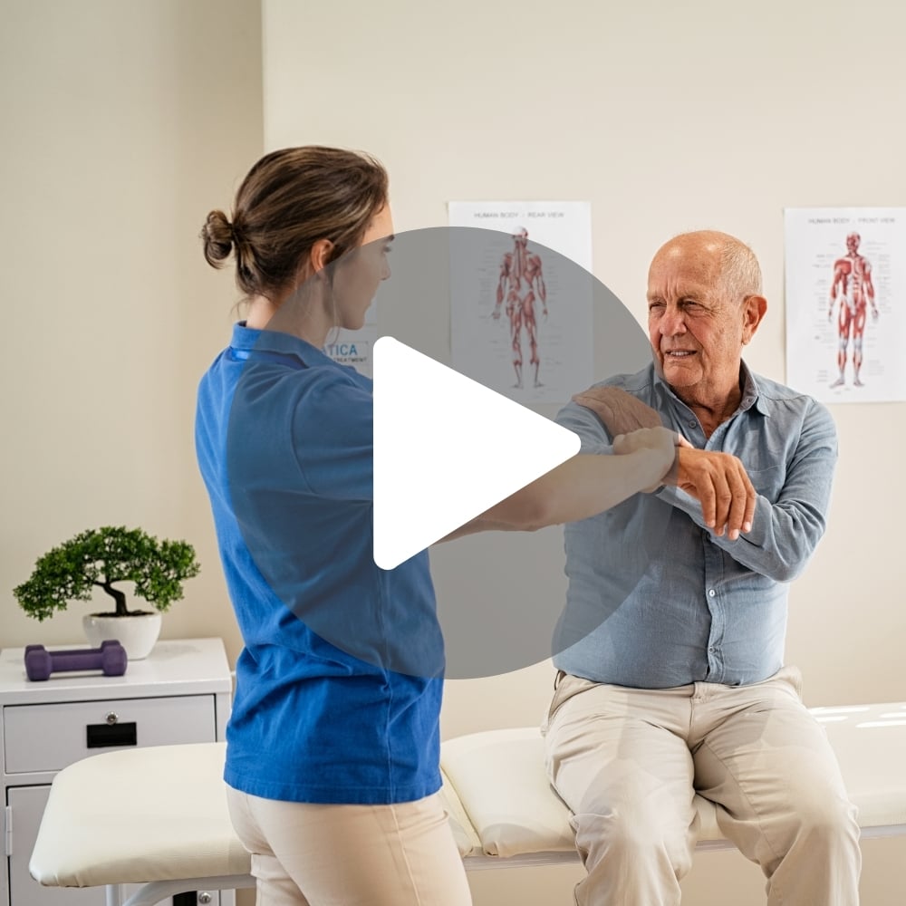 Female chiropractor with male patient